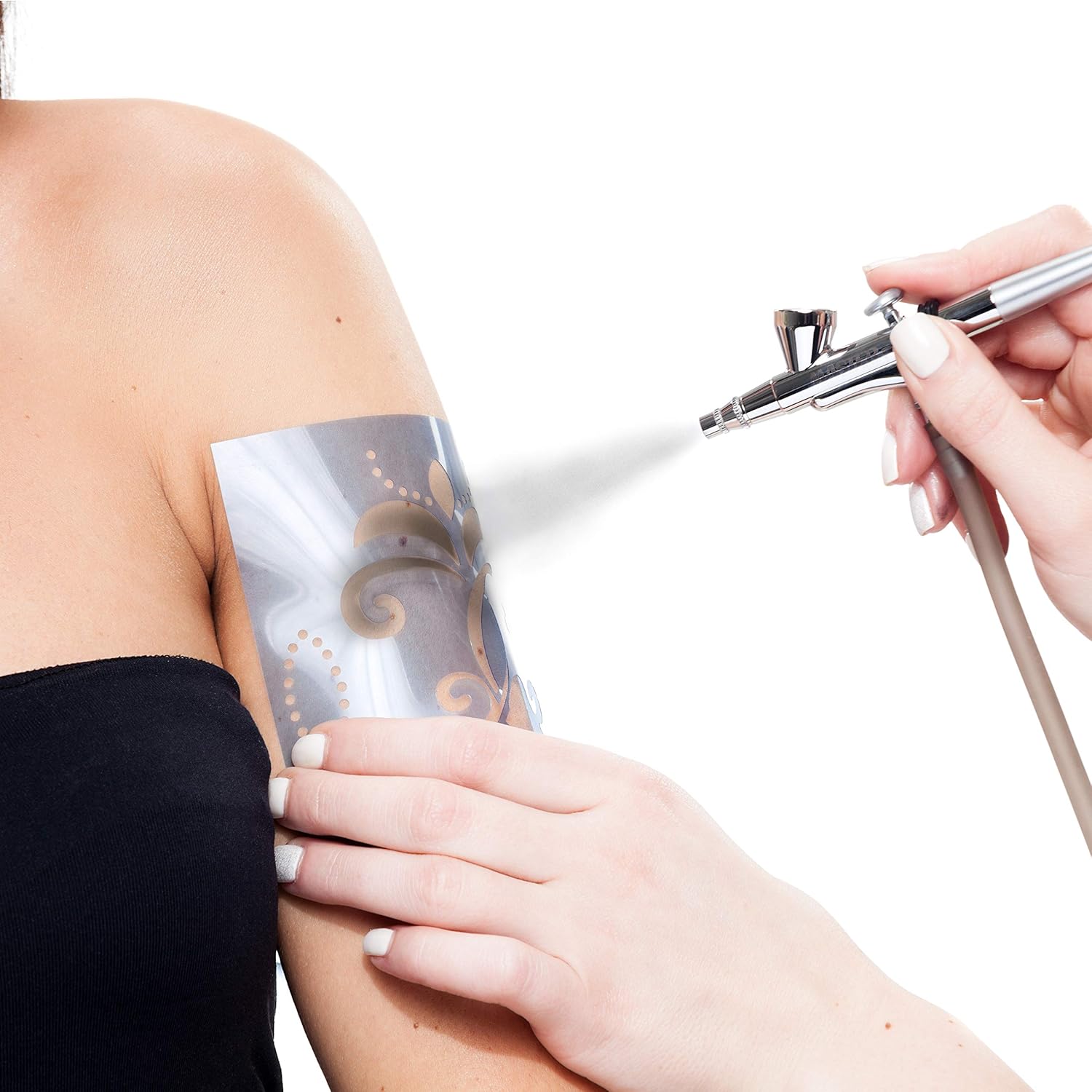 Fine Mist of an airbrush gun. Air and Ink Airbrush Tattoos and Face Painting in Winnipeg, Manitoba and NW Ontario