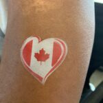 Stylized Canadian Flag Airbrush Tattoo. Airbrush tattoo and face painting gallery. Airbrush Tattoos in Winnipeg and NW Ontario.