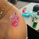 Stylized Flower Airbrush Tattoo. Airbrush tattoo and face painting gallery. Airbrush Tattoos in Winnipeg and NW Ontario.