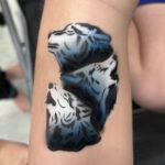 Wolves custom airbrush tattoo | Air and Ink Airbrush Tattoos | Winnipeg, Manitoba, Northwestern Ontario